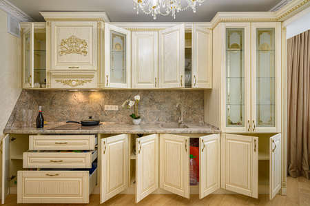 Front view of luxury modern neoclassic beige kitchen interiorの写真素材