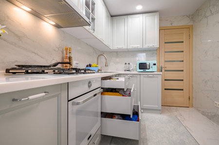 White and grey new modern well designed kitchen interiorの写真素材
