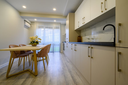 Large beige and cream luxury kitchen interiorの写真素材
