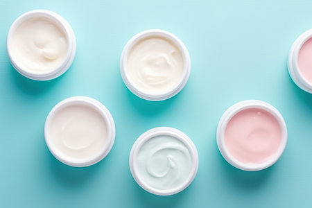 Six containers of cream on a blue background. AI generative imageの素材