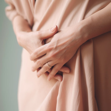 A woman with her hands on her stomach. Generative AI image.の素材