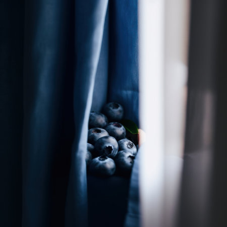 A bunch of blueberries sitting on top of a table. Generative AI image.の素材