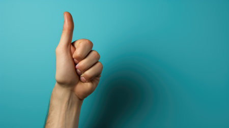 A persons hand holding up a finger. Generative AI image.の素材