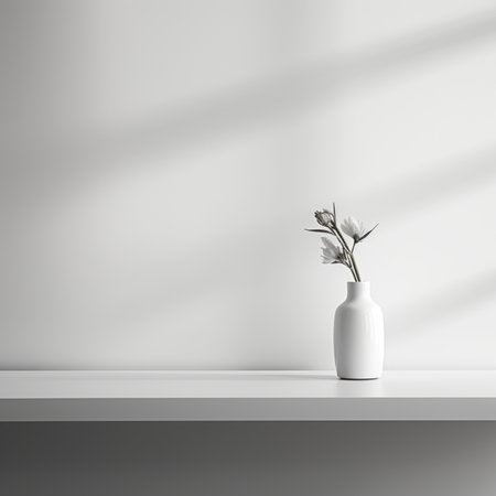 A white vase with a single flower in it on a table, AIの素材