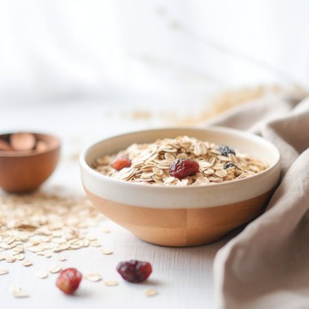 Oatmeal with dried fruits and nuts in a bowl on a white table, AIの素材