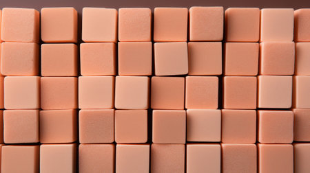 A close up of a bunch of peach fuzz pink blocks stacked on top of each other, AIの素材
