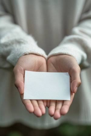 A person holding a blank piece of paper in their hands, AIの素材