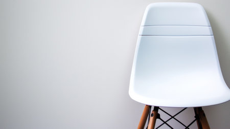 A white chair with wooden legs against a wall, AIの素材
