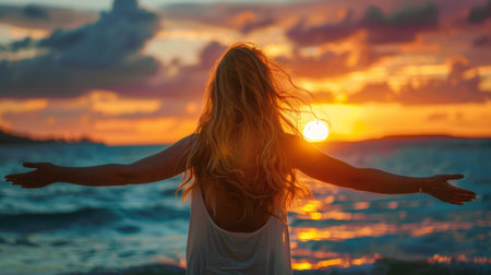 A woman with her arms outstretched on a beach at sunset, AIの素材