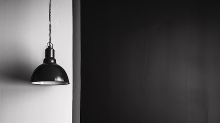 A black and white photo of a lamp hanging from the wall, AIの素材