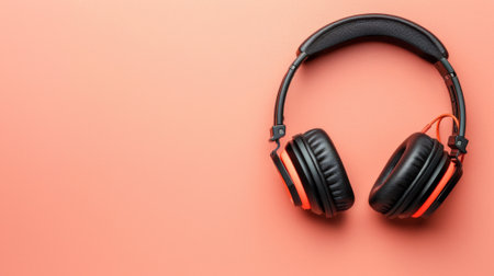 A pair of black headphones on a pink background, AIの素材