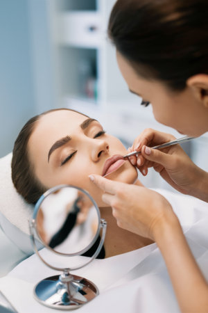 A woman getting a facial at the beauty salon with mirror, AIの素材