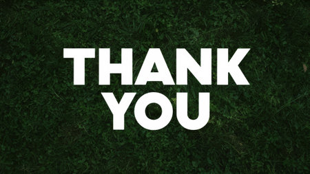 A thank you message on a green field with grass, AIの素材