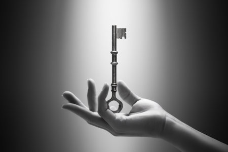A hand holding a key in the palm of their hands, AIの素材