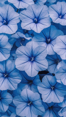 A close up of a bunch of blue flowers with small white dots, AIの素材