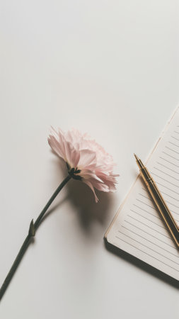 A flower and a pen on top of paper with notepad, AIの素材