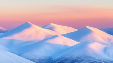 Snowy mountains bathed in soft pink and orange hues at sunrise, AIの素材