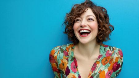 Smiling woman with curly hair against a vibrant blue background, AIの素材