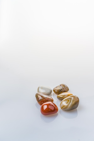 Beautiful pebble stone on white backgroundの写真素材