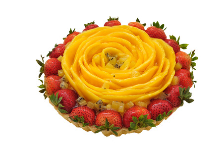 Strawberry and mango cake isolated on whiteの写真素材