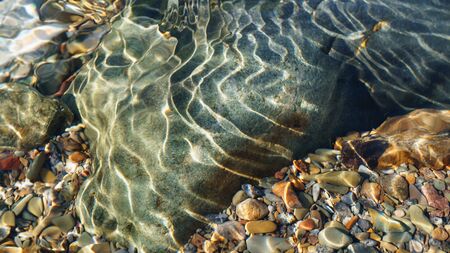 Crystal clear water of small brook in Altai steppe in Chagan-Ouzun place