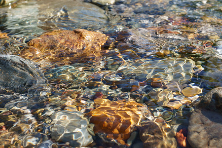 Crystal clear water of small brook in Altai steppe in Chagan-Ouzun place