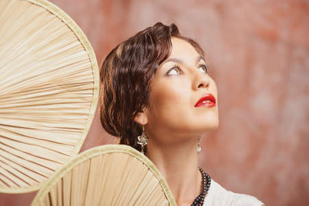 Young girl posing and looking studio portrait vintage style