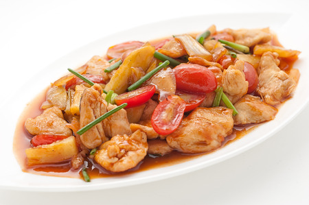 Fried chicken with cashew nuts isolated on whiteの写真素材