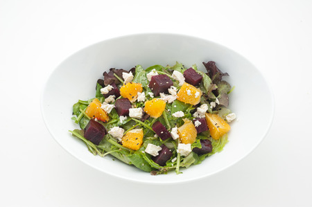 Salad with beetroot and pineapple isolated on whiteの写真素材