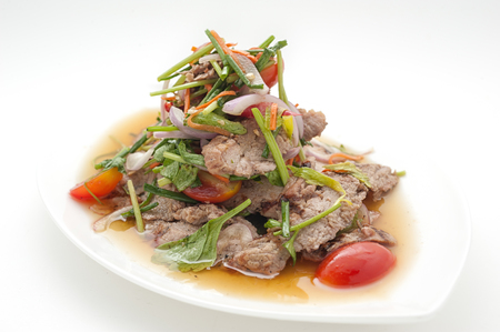 Stewed beef with vegetables isolated on whiteの写真素材