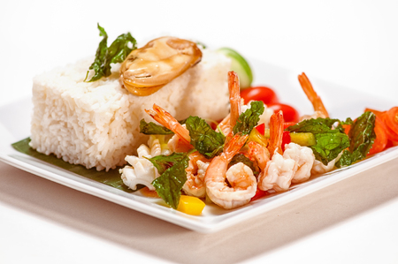 Shrimps and mussels with steam riceの写真素材