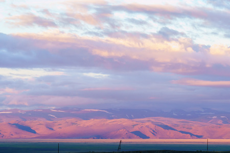 Scenic sunset and sunrise in mountainous region of Altaiの写真素材