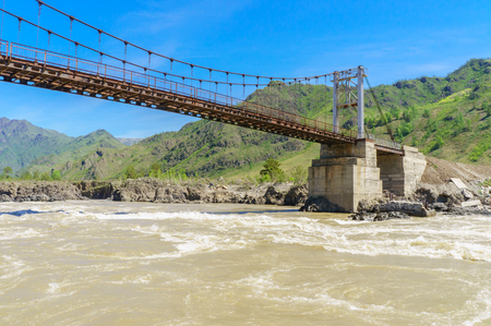 Detail of cable-stayed bridge over river Katun in Altai, in summerの写真素材