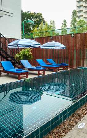 Reception and swimming pool of Thai hotel in Phuketの写真素材