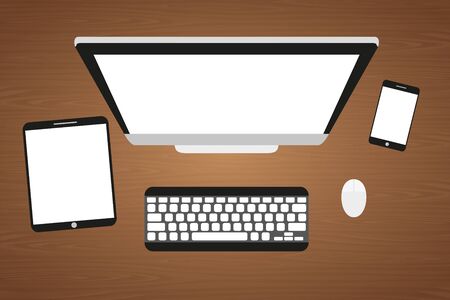 Workplace at a wooden table. Monitor, keyboard, computer mouse, tablet and smartphoneのイラスト素材