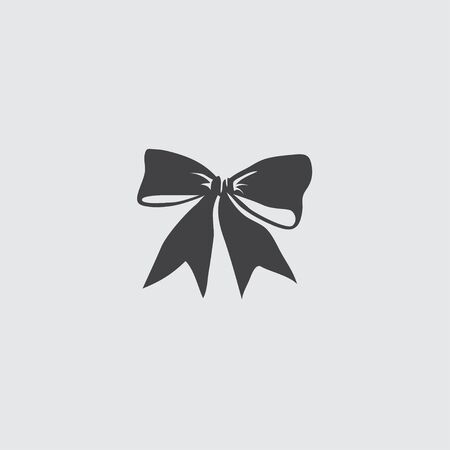 Christmas bow icon icon in a flat design in black color. Vector illustrationのイラスト素材