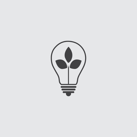 Lightbulb with leaf icon in a flat design in black color. Vector illustration eps10のイラスト素材