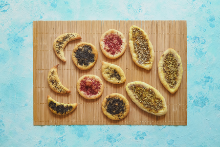Scones with herbs spices on a bamboo napkin. Top view. Arabic cuisine.の写真素材