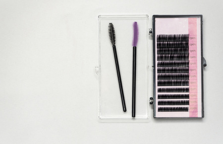 False eyelashes and tools for sticking eyelashes.
