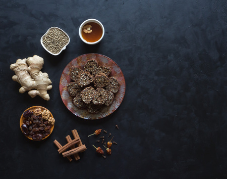 Dessert of hemp seeds. Ingredients for making Superfoods rolls on a black tableの写真素材