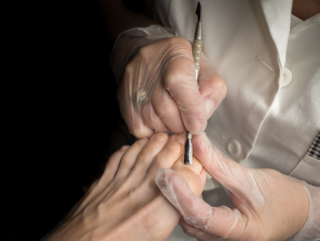 Woman's feet close-up, pedicure, nail beauty