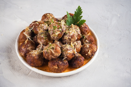 Swedish Meatballs on a plate in the gray tableの写真素材