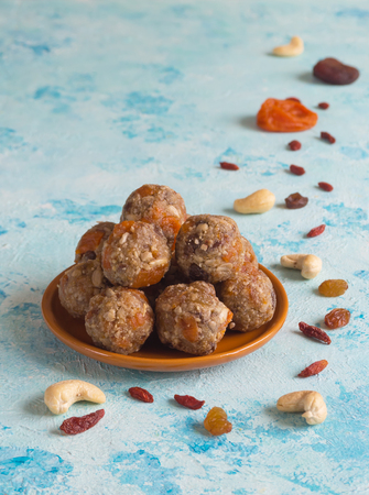 Healthy organic energy bites with nuts - vegan vegetarian raw snack or meal.の写真素材
