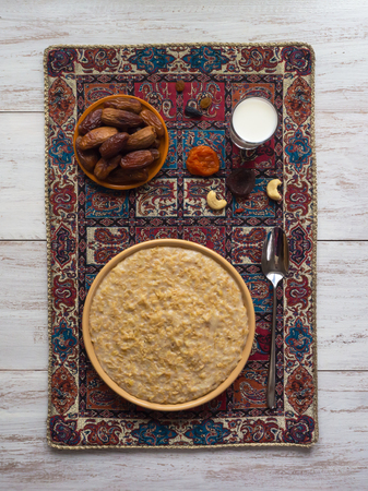 Oatmeal with dates and milk. Ramadan foodの写真素材