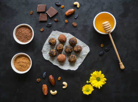 Ingredients for energy bites on white wooden background.の写真素材