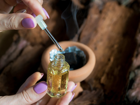 Arabian oud attar or agarwood oil fragrances in mini bottle.
