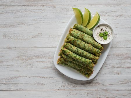 Spinach Adai - Indian green pancakes. Vegetarian food.の写真素材