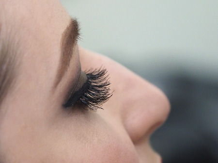 Eyelash extension. A woman's eye with lashes. Oriental makeup.の写真素材