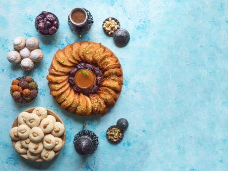 Arabic sweets. Arabian Qatayef pancake stuffed with sweet cheese and nutsの写真素材
