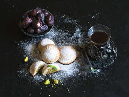 Ramadan sweets background. Cookies of El Fitr Islamic Feast. Arabic cookies Maamoul.